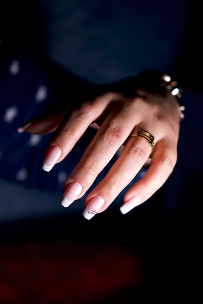 Long almond nails with elegant white French tips
