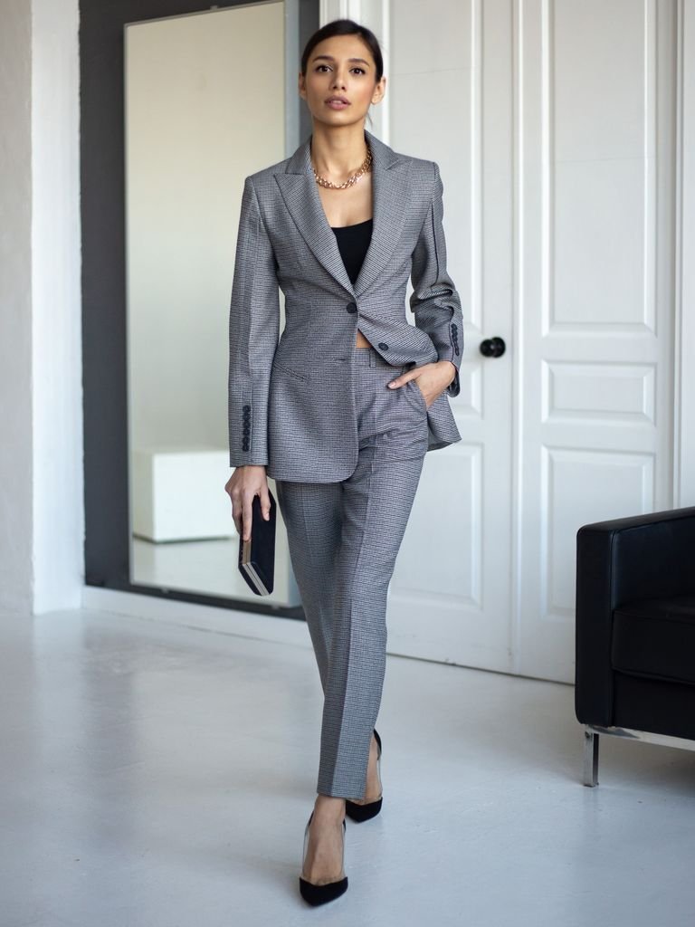 Tailored fall work outfit with a blazer, fine knit and trousers