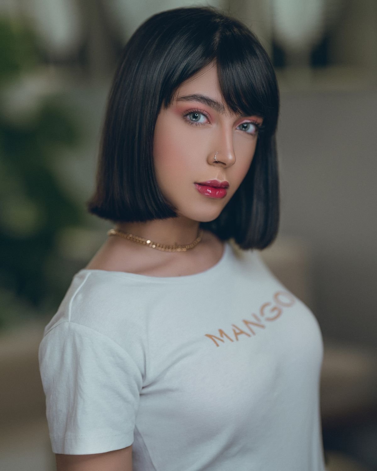 Timeless bob hairstyles: sleek chin-length blunt bob with soft fringe bangs